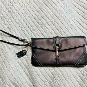 Brand New navy Coach wristlet with light blue stitching